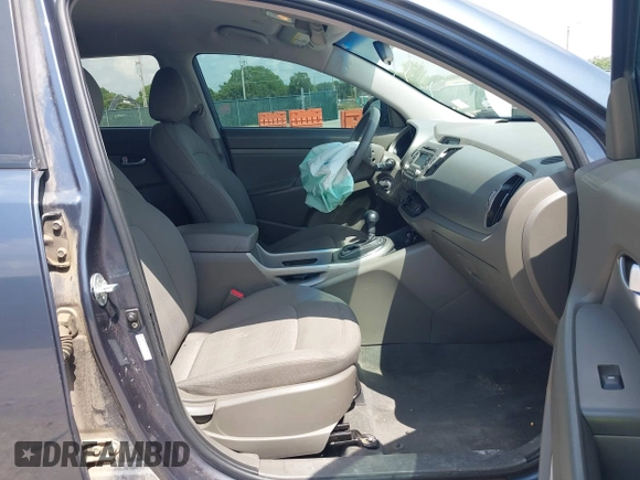 2012 Kia Sportage LX with VIN KNDPB3A2XC7179136, listed as a IAAI auction lot 42298343 with 206,303 mi miles and . Bid and sale history available at DreamBid. Image 5.