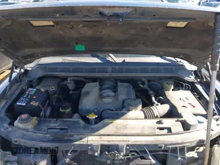 2004 Nissan Titan LE with VIN 1N6AA07A44N591357, listed as a IAAI auction lot 41464024 with 296,954 mi miles and . Bid and sale history available at DreamBid. Image 10.