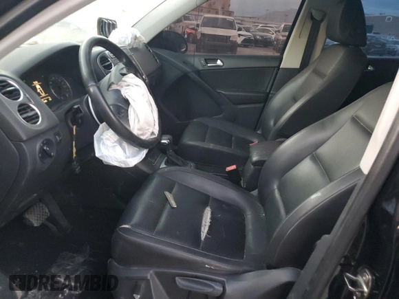 2010 Volkswagen Tiguan Wolfsburg Edition with VIN WVGAV7AX5AW002900, listed as a Copart auction lot 86214514 with 153,645 mi miles and Salvage title. Bid and sale history available at DreamBid. Image 7.