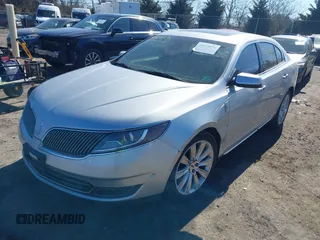 2013 Lincoln MKS EcoBoost with VIN 1LNHL9FT9DG613100, listed as a IAAI auction lot 41614096 with 207,789 mi miles. Bid and sale history available at carsss.com. Image 2.