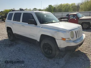 2014 Jeep Patriot Sport with VIN 1C4NJRBB7ED728808, listed as a Copart auction lot 51822075 with 187,771 mi miles and Salvage Title. Bid and sale history available at DreamBid. Image 4.