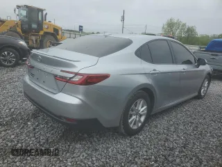 2025 Toyota Camry LE with VIN 4T1DAACKXSU043785, listed as a Copart auction lot 52207785 with 9,410 mi miles and Salvage Title. Bid and sale history available at DreamBid. Image 3.