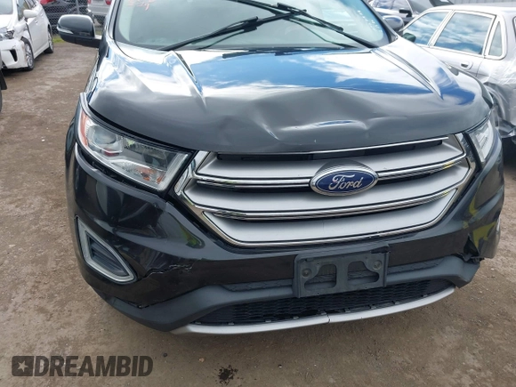 2015 Ford Edge SEL with VIN 2FMTK3J97FBB09189, listed as a IAAI auction lot 41627158 with 154,848 mi miles. Bid and sale history available at carsss.com. Image 6.