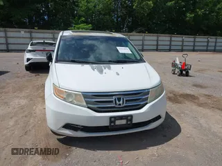 2012 Honda Odyssey EX-L with VIN 5FNRL5H62CB019238, listed as a IAAI auction lot 42524694 with 271,384 mi miles and . Bid and sale history available at DreamBid. Image 6.