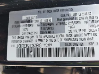 2018 Mazda CX-5 Grand Touring with VIN JM3KFBDM2J0373386, listed as a IAAI auction lot 42200795 with 70,111 mi miles and . Bid and sale history available at DreamBid. Image 9.