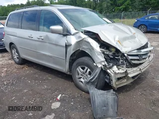 2005 Honda Odyssey EX-L with VIN 5FNRL38695B036836, listed as a IAAI auction lot 42369670 with 222,061 mi miles and . Bid and sale history available at DreamBid. Image 1.