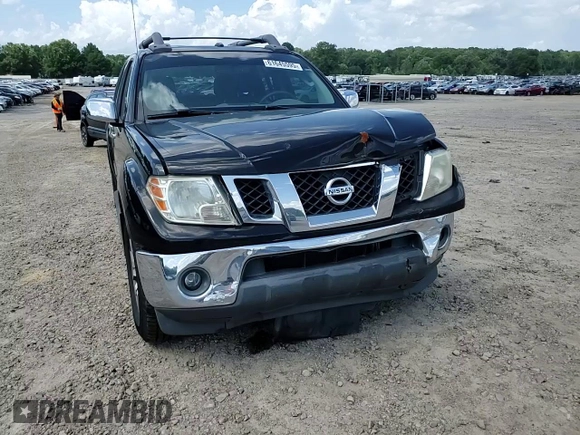 2011 Nissan Frontier SL with VIN 1N6AD0ERXBC440046, listed as a Copart auction lot 61645595 with 130,639 mi miles and Salvage title. Bid and sale history available at DreamBid. Image 13.