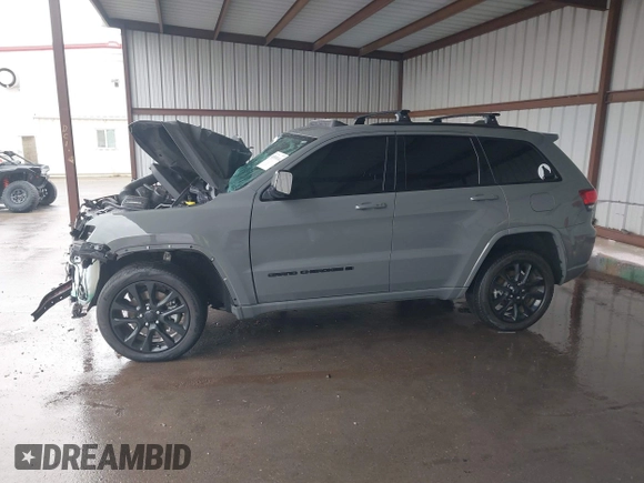 2022 Jeep Grand Cherokee Laredo E z VIN 1C4RJFAG2NC120634, wystawiony jako IAAI lot #41555164 z przebiegiem Nie podano mil oraz . Historia ofert i sprzedaży dostępna na DreamBid. Obrazek 14.