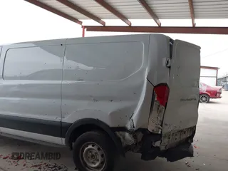 2019 Ford Transit with VIN 1FTYE1ZM2KKB46391, listed as a IAAI auction lot 41362328 with 128,327 mi miles and . Bid and sale history available at carsss.com. Image 19.
