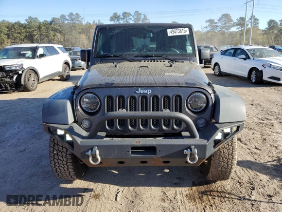 2014 Jeep Wrangler Unlimited Rubicon with VIN 1C4BJWFG4EL256824, listed as a Copart auction lot 49473815 with 117,264 mi miles and Salvage Title. Bid and sale history available at carsss.com. Image 5.