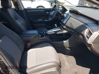 2019 Honda Clarity z VIN JHMZC5F15KC006498, wystawiony jako IAAI lot #42384751 z przebiegiem 368 395 mil mil oraz . Historia ofert i sprzedaży dostępna na DreamBid. Obrazek 5.