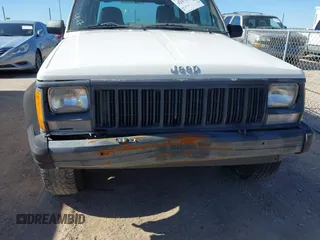 1996 Jeep Cherokee SE with VIN 1J4FJ28S0TL328637, listed as a IAAI auction lot 42078412 with 333,223 mi miles and . Bid and sale history available at DreamBid. Image 6.