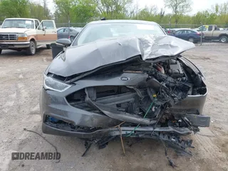 2018 Ford Fusion Titanium with VIN 3FA6P0RU1JR120392, listed as a IAAI auction lot 42145342 with Not provided miles and . Bid and sale history available at DreamBid. Image 12.