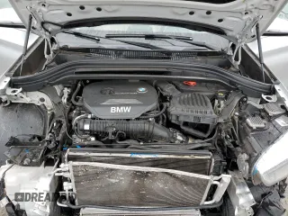 2017 BMW X1 sDrive28i with VIN WBXHU7C33H5H34013, listed as a Copart auction lot 38409444 with 87,558 mi miles and Salvage Title. Bid and sale history available at carsss.com. Image 11.