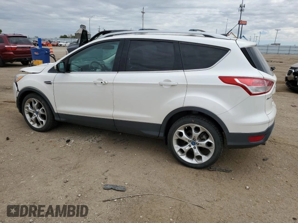 2013 Ford Escape Titanium with VIN 1FMCU0J90DUB90746, listed as a Copart auction lot 72767464 with 67,388 mi miles and Salvage Title. Bid and sale history available at carsss.com. Image 2.