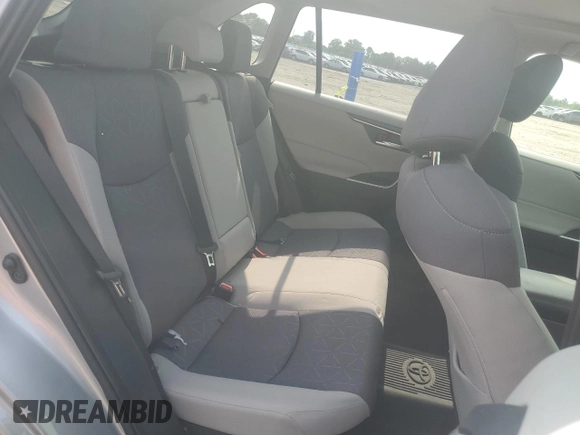2023 Toyota RAV4 Hybrid XLE with VIN JTMRWRFV7PD166743, listed as a Copart auction lot 59964505 with 87,404 mi miles and Salvage title. Bid and sale history available at DreamBid. Image 11.