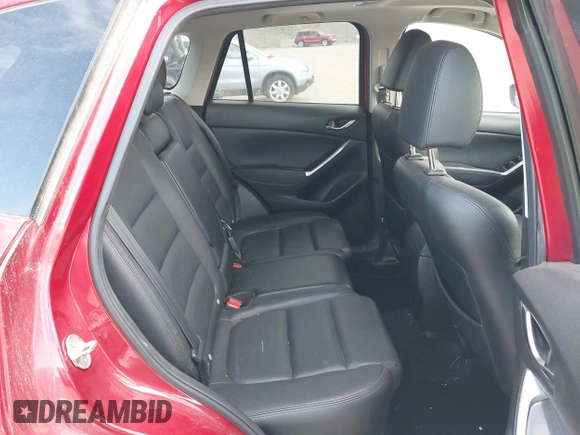 2016 Mazda CX-5 Grand Touring with VIN JM3KE4DY8G0729446, listed as a IAAI auction lot 41871207 with 89,258 mi miles. Bid and sale history available at carsss.com. Image 8.