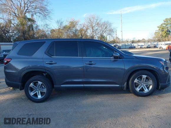 2023 Honda Pilot EX-L with VIN 5FNYG1H5XPB044829, listed as a IAAI auction lot 41396208 with 15,277 mi miles and . Bid and sale history available at DreamBid. Image 14.