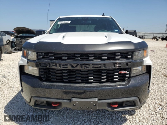 2022 Chevrolet Silverado 1500 Custom Trail Boss with VIN 3GCPYCEL8NG123561, listed as a Copart auction lot 49740345 with 34,837 mi miles and Salvage Title. Bid and sale history available at DreamBid. Image 5.