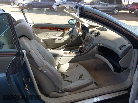 2005 Mercedes-Benz SL 500 with VIN WDBSK75F95F106944, listed as a IAAI auction lot 41970698 with 123,881 mi miles and . Bid and sale history available at DreamBid. Image 5.