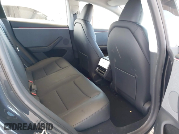 2025 Tesla Model 3 Long Range with VIN 5YJ3E1EA1SF923548, listed as a IAAI auction lot 42046257 with 3,979 mi miles and . Bid and sale history available at carsss.com. Image 8.