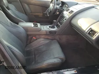 2008 Aston Martin Vantage z VIN SCFBB04B88GD08555, wystawiony jako Copart lot #73878724 z przebiegiem Nie podano mil oraz Szkoda całkowita • Salvage title. Historia ofert i sprzedaży dostępna na DreamBid. Obrazek 10.