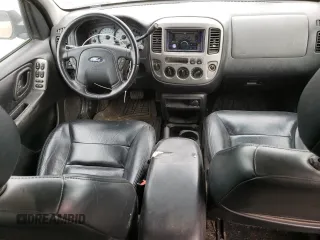 2004 Ford Escape Limited with VIN 1FMCU94184KB62778, listed as a Copart auction lot 70992184 with 165,199 mi miles and Salvage Title. Bid and sale history available at carsss.com. Image 8.