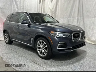 2021 BMW X5 xDrive40i with VIN 5UXCR6C02M9F23086, listed as a Copart auction lot 65008095 with 67,799 mi miles and Clean title. Bid and sale history available at DreamBid. Image 1.