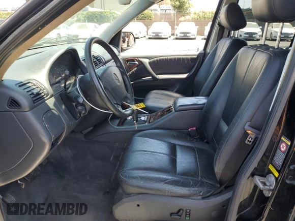 2000 Mercedes-Benz M 320/430/500 with VIN 4JGAB72EXYA193906, listed as a Copart auction lot 62025125 with 142,808 mi miles and Salvage title. Bid and sale history available at DreamBid. Image 7.