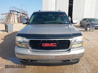 2005 GMC Yukon SLT with VIN 1GKEK13T95R203827, listed as a IAAI auction lot 41815086 with 136,671 mi miles. Bid and sale history available at carsss.com. Image 12.