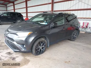 2016 Toyota RAV4 SE with VIN JTMJFREV7GJ072488, listed as a IAAI auction lot 42031254 with 106,901 mi miles. Bid and sale history available at carsss.com. Image 2.