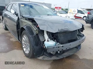 2012 Chrysler 300 Limited with VIN 2C3CCACG9CH227436, listed as a IAAI auction lot 42023040 with 76,508 mi miles. Bid and sale history available at carsss.com. Image 6.