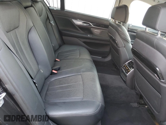 2019 BMW 7 Series 740i with VIN WBA7E2C52KB217153, listed as a Copart auction lot 65205835 with 61,981 mi miles and Clean title. Bid and sale history available at DreamBid. Image 10.