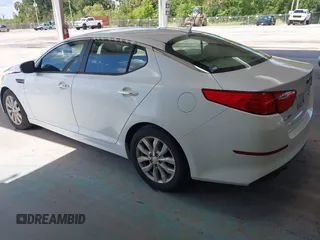 2015 Kia Optima EX z VIN 5XXGN4A72FG350868, wystawiony jako IAAI lot #42242887 z przebiegiem 222 208 mil mil oraz . Historia ofert i sprzedaży dostępna na DreamBid. Obrazek 3.