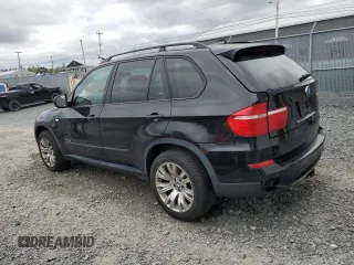 2012 BMW X5 35i z VIN 5UXZV4C5XCL752071, wystawiony jako Copart lot #56623145 z przebiegiem 180 161 mil mil oraz Czysty tytuł • Clean title. Historia ofert i sprzedaży dostępna na DreamBid. Obrazek 2.