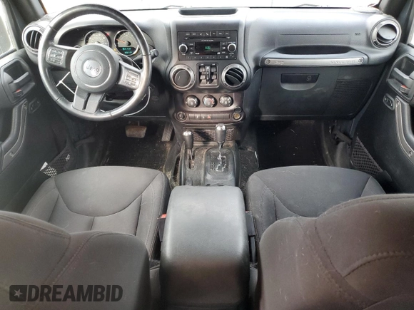 2018 Jeep Wrangler JK Unlimited Sport S with VIN 1C4BJWDG1JL907517, listed as a Copart auction lot 77398184 with 60,217 mi miles and Salvage Title. Bid and sale history available at carsss.com. Image 8.
