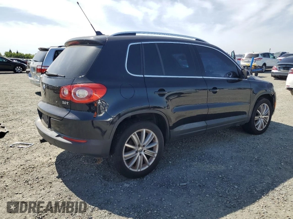 2011 Volkswagen Tiguan SEL w/Premium Navi with VIN WVGAV7AX2BW550158, listed as a Copart auction lot 57649235 with 133,346 mi miles and Clean title. Bid and sale history available at DreamBid. Image 3.