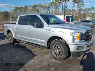 2018 Ford F-150 XL with VIN 1FTEW1C53JFE73911, listed as a IAAI auction lot 41690569 with 113,172 mi miles. Bid and sale history available at carsss.com. Image 1.