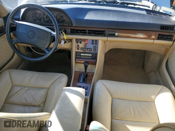 1989 Mercedes-Benz 300 with VIN WDBCA24DXKA468784, listed as a Copart auction lot 46307885 with 233,061 mi miles and Salvage Title. Bid and sale history available at DreamBid. Image 8.