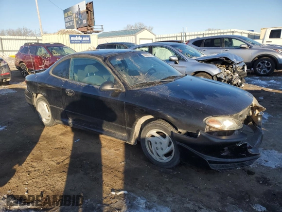 2002 Ford Escort ZX2 Standard z VIN 3FAFP11332R100994, wystawiony jako Copart lot #88085795 z przebiegiem 83 162 mil mil oraz Szkoda całkowita • Salvage title. Historia ofert i sprzedaży dostępna na DreamBid. Obrazek 4.