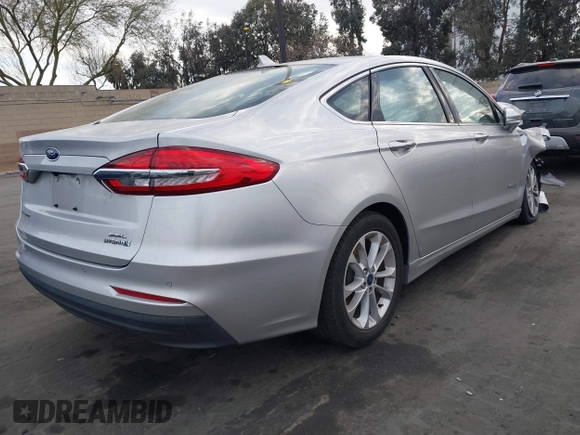2019 Ford Fusion Hybrid SEL with VIN 3FA6P0MU3KR262056, listed as a IAAI auction lot 41643020 with 1 mi miles. Bid and sale history available at carsss.com. Image 4.