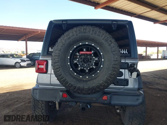 2019 Jeep Wrangler Unlimited Sport S z VIN 1C4HJXDG7KW557682, wystawiony jako IAAI lot #42586742 z przebiegiem 49 741 mil mil oraz . Historia ofert i sprzedaży dostępna na DreamBid. Obrazek 15.