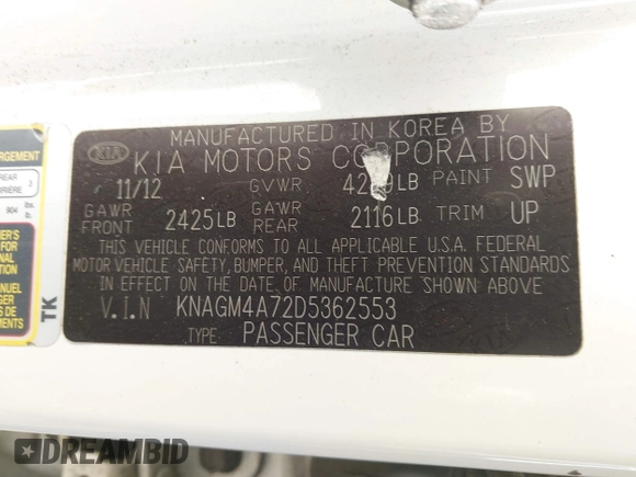 2013 Kia Optima LX with VIN KNAGM4A72D5362553, listed as a IAAI auction lot 42004593 with 127,918 mi miles. Bid and sale history available at carsss.com. Image 9.