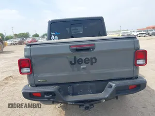 2021 Jeep Gladiator Sport S z VIN 1C6JJTAM1ML607525, wystawiony jako IAAI lot #41941550 z przebiegiem 59 283 mil mil oraz . Historia ofert i sprzedaży dostępna na DreamBid. Obrazek 16.