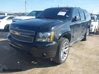 2014 Chevrolet Suburban LT with VIN 1GNSKJE7XER164316, listed as a IAAI auction lot 41306117 with 240,445 mi miles. Bid and sale history available at carsss.com. Image 20.