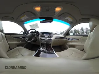 2015 Infiniti Q70 with VIN JN1BY1ARXFM562111, listed as a IAAI auction lot 42473521 with 123,212 mi miles and . Bid and sale history available at DreamBid. Image 18.