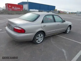 2002 Mazda 626 LX with VIN 1YVGF22DX25263864, listed as a IAAI auction lot 41846129 with 282,516 mi miles. Bid and sale history available at carsss.com. Image 4.