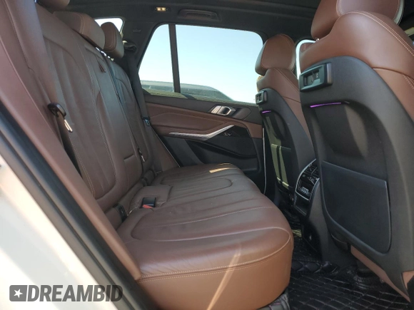 2020 BMW X5 xDrive40i with VIN 5UXCR6C09L9C13127, listed as a Copart auction lot 53941035 with 76,685 mi miles and Salvage title. Bid and sale history available at DreamBid. Image 11.