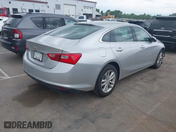 2018 Chevrolet Malibu LT z VIN 1G1ZD5ST7JF150565, wystawiony jako IAAI lot #42069844 z przebiegiem 180 382 mil mil oraz . Historia ofert i sprzedaży dostępna na DreamBid. Obrazek 4.