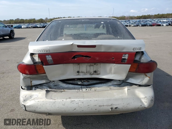 1996 Nissan Sentra XE z VIN 3N1AB41D5TL010573, wystawiony jako Copart lot #47284155 z przebiegiem 158 185 mil mil oraz Szkoda całkowita • Salvage title. Historia ofert i sprzedaży dostępna na DreamBid. Obrazek 6.